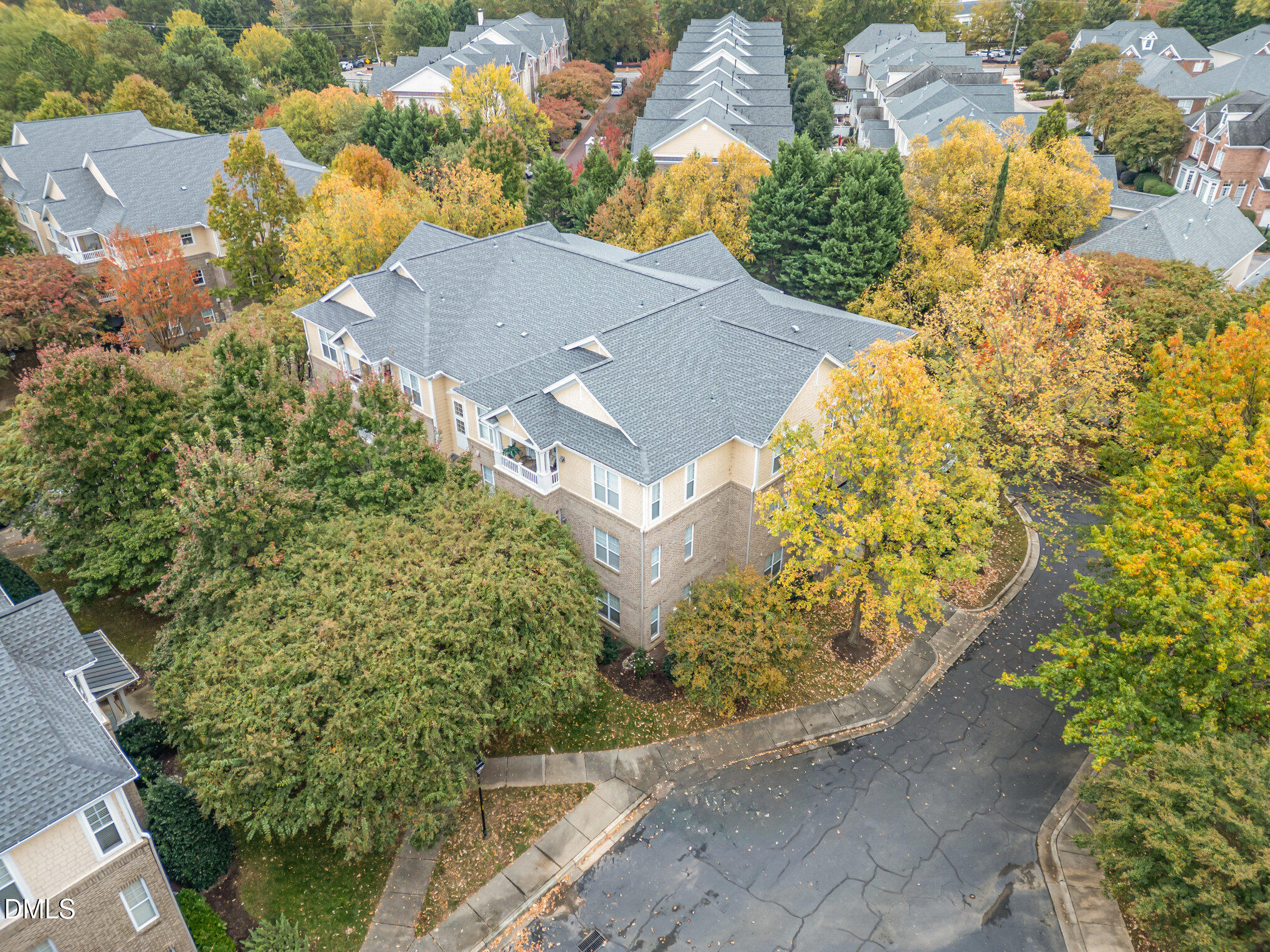3121 Hemlock Forest Circle, Unit 203 Raleigh, NC 27612 - Photo 28 of 33 an aerial view of residential houses with outdoor space