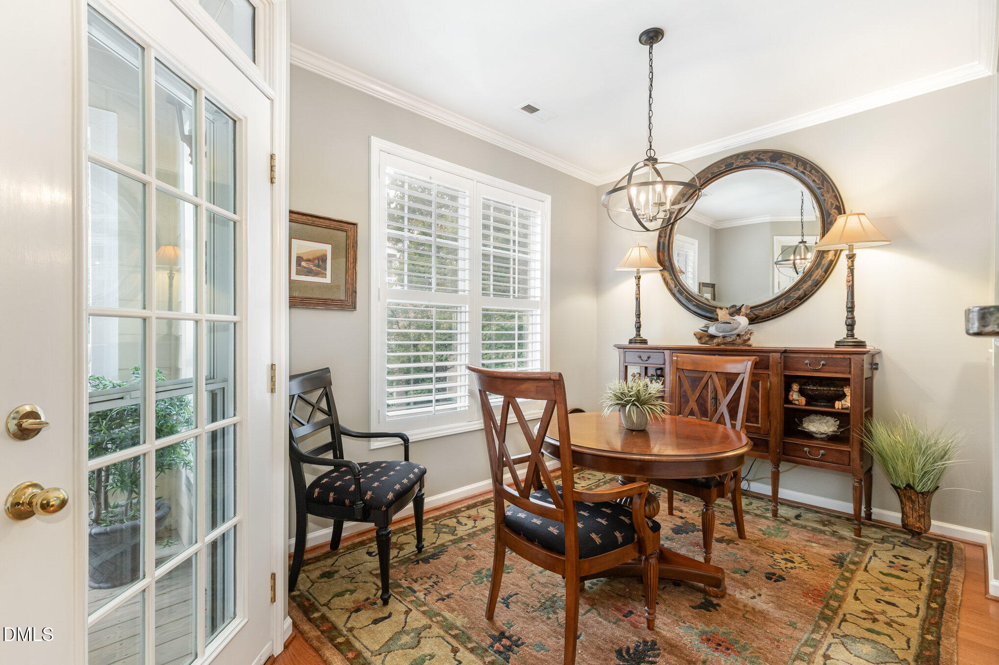 3121 Hemlock Forest Circle, Unit 203 Raleigh, NC 27612 - Photo 3 of 33 a view of a dining room with furniture window and outside view