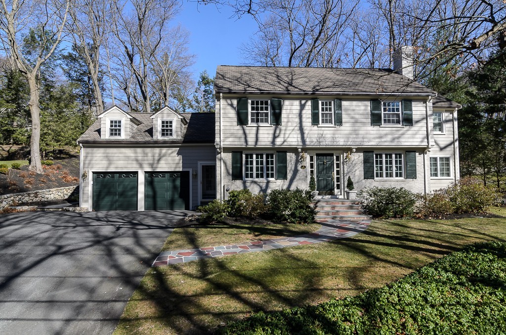 64 Emerson Road Wellesley, MA 02481 - Photo 1 of 21 a front view of a house with yard