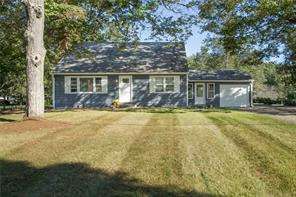 front view of house with a garden