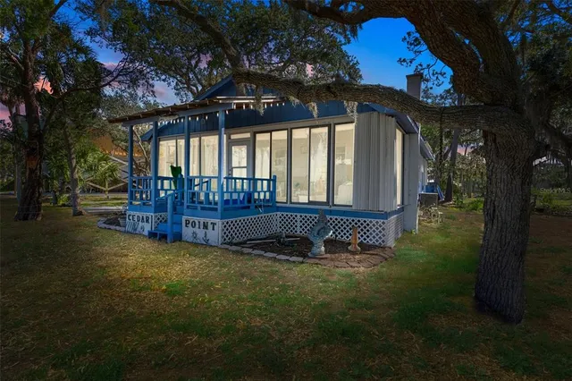 a view of an chairs and table in the patio