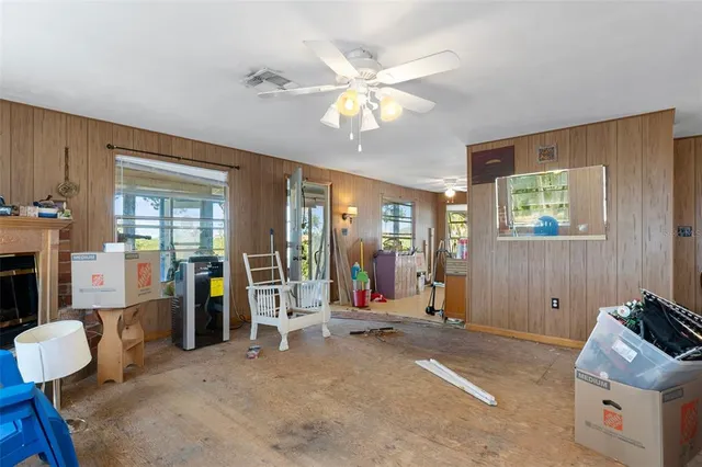 a living room with furniture and a window