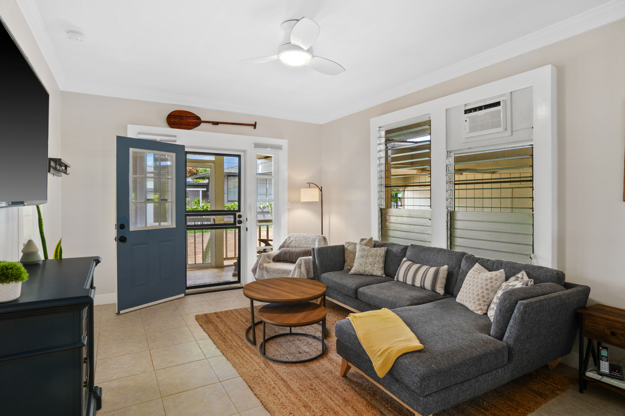 4780 Iiwi Road, Unit 1 Kapaa, HI 96746 - Photo 7 of 24 a living room with furniture and a window