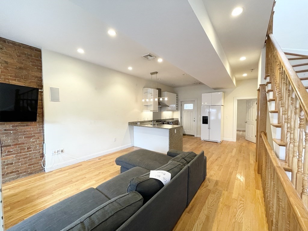98 L Street, Unit STREET Boston, MA 02127 - Photo 8 of 19 a large white kitchen with a large window