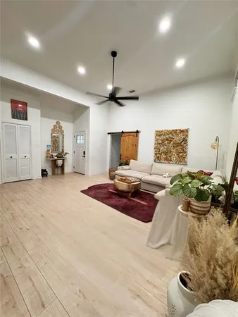 a bedroom with furniture and a bed