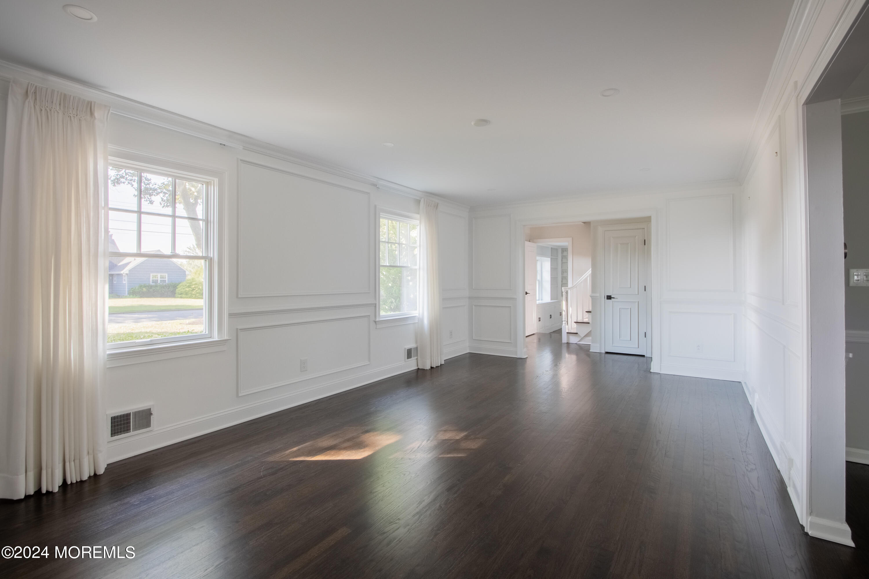 67 Rivers Edge Drive Little Silver, NJ 07739 - Photo 14 of 40 an empty room with wooden floor and windows