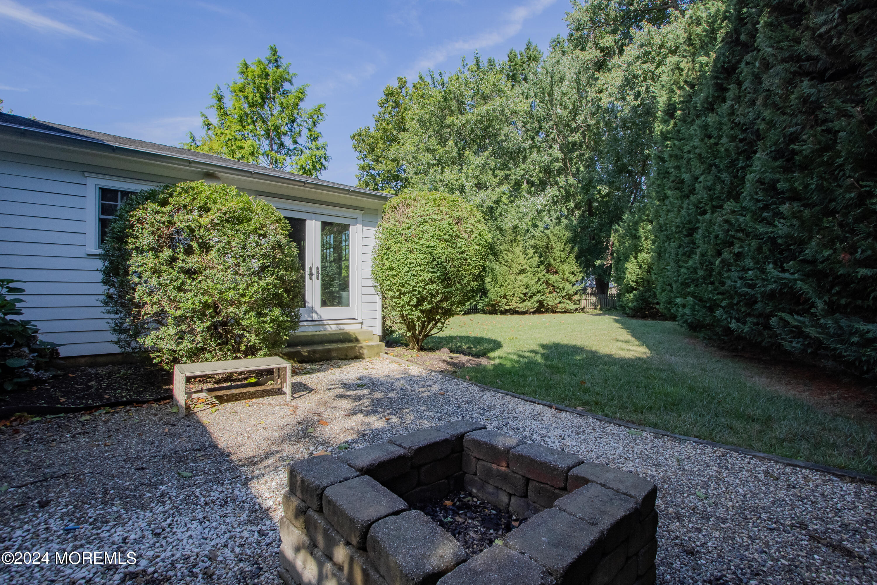 67 Rivers Edge Drive Little Silver, NJ 07739 - Photo 27 of 40 a view of a backyard with a garden