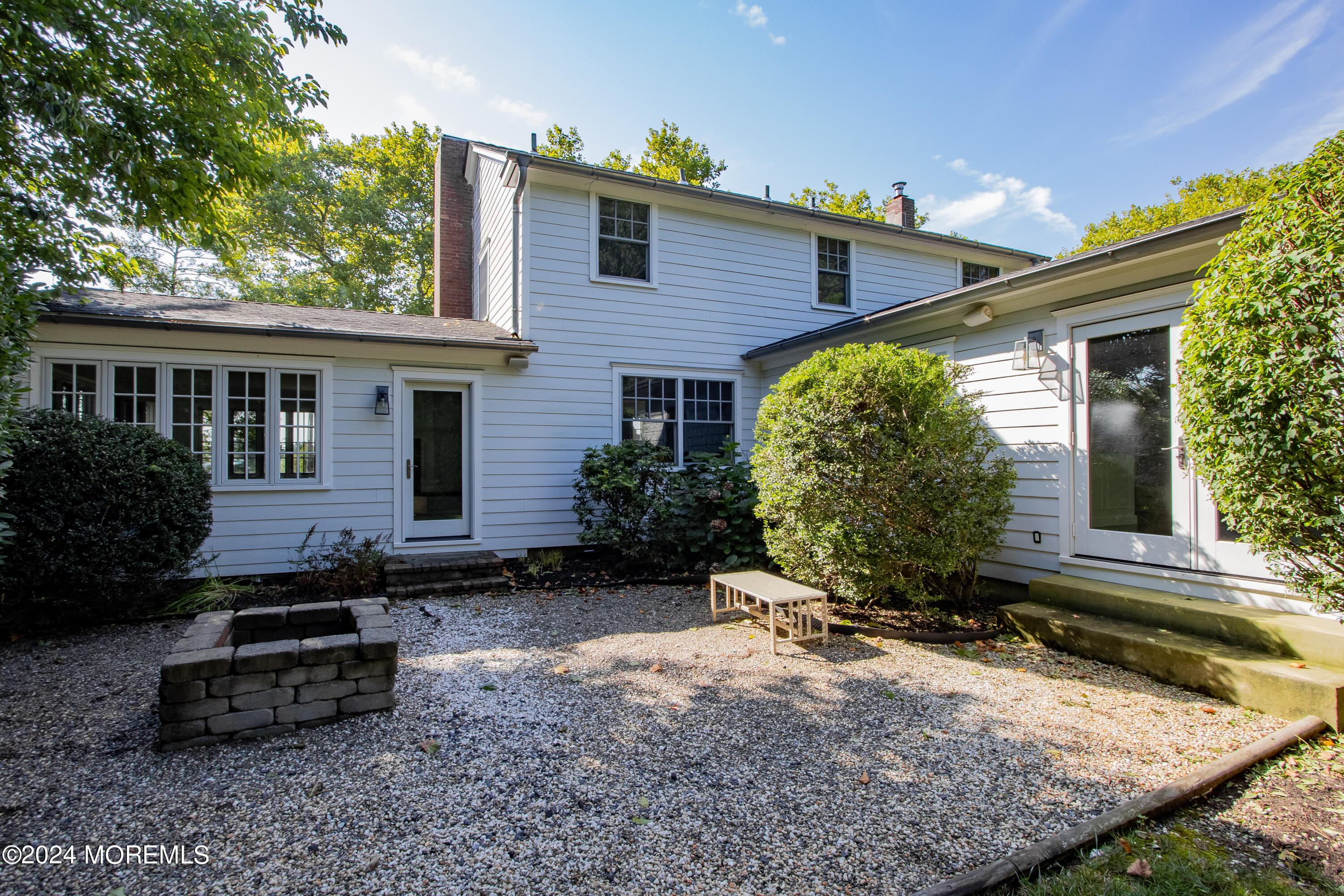 67 Rivers Edge Drive Little Silver, NJ 07739 - Photo 28 of 40 a front view of a house with a yard