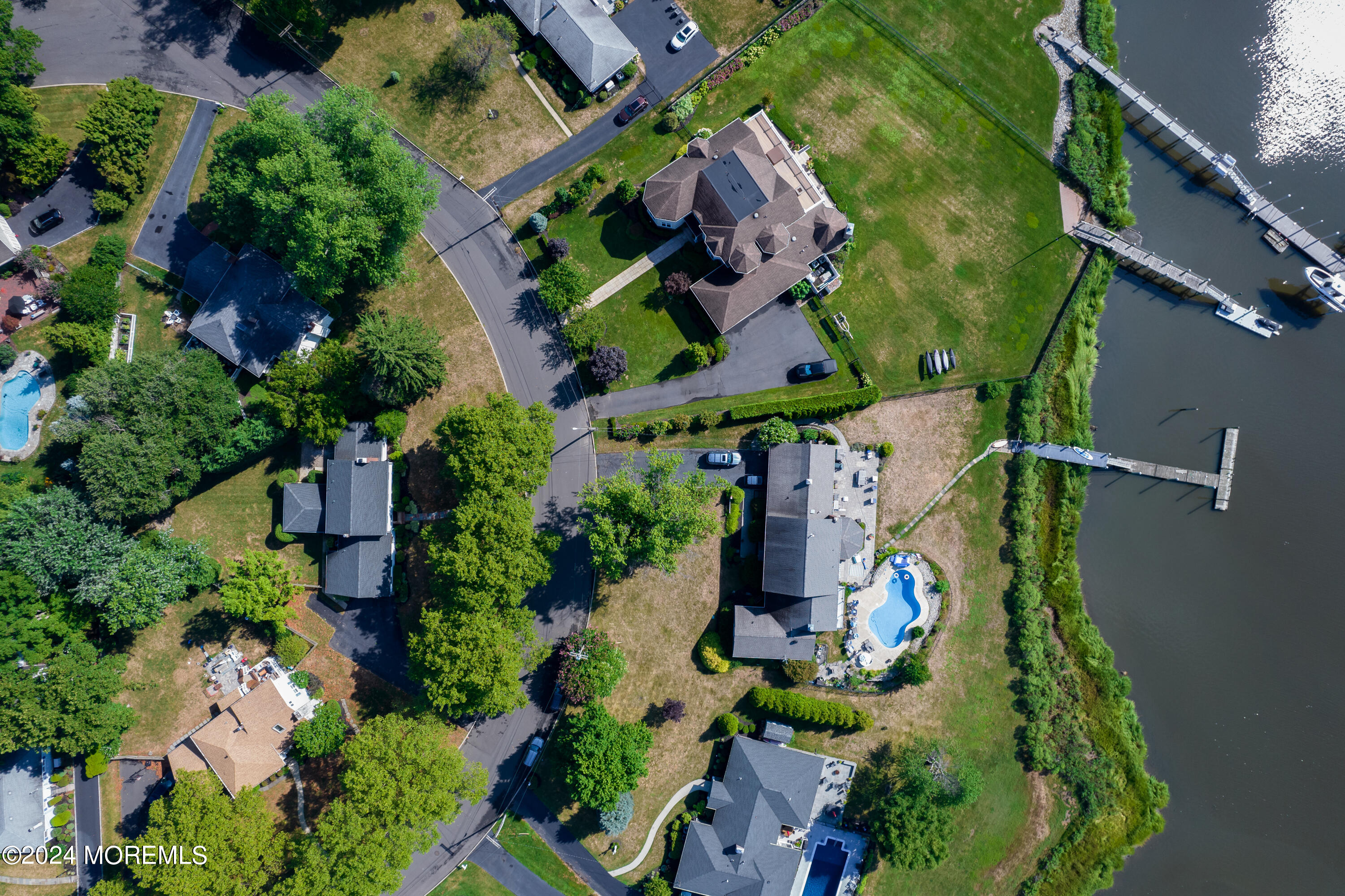 67 Rivers Edge Drive Little Silver, NJ 07739 - Photo 29 of 40 an aerial view of a house with a yard and garden