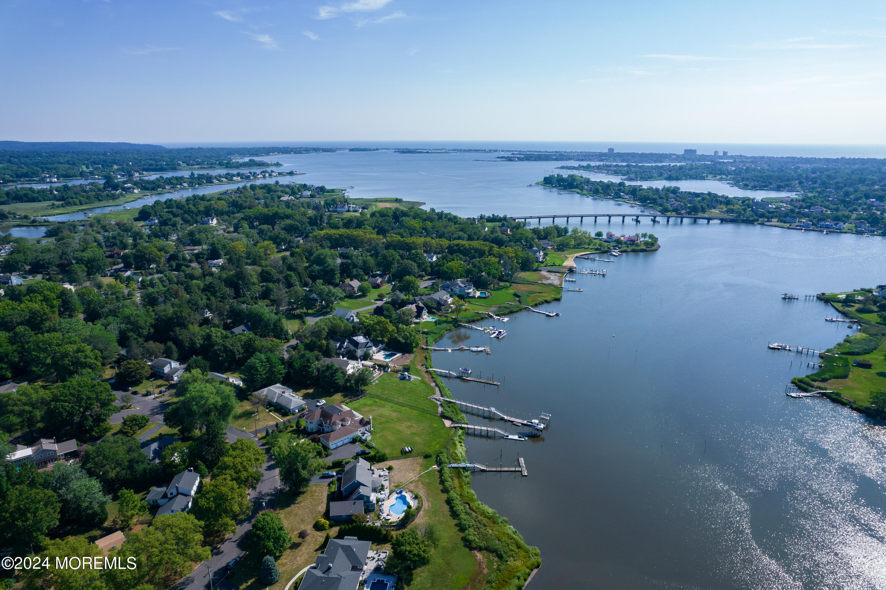 67 Rivers Edge Drive Little Silver, NJ 07739 - Photo 30 of 40 an aerial view of a houses with a yard and lake view
