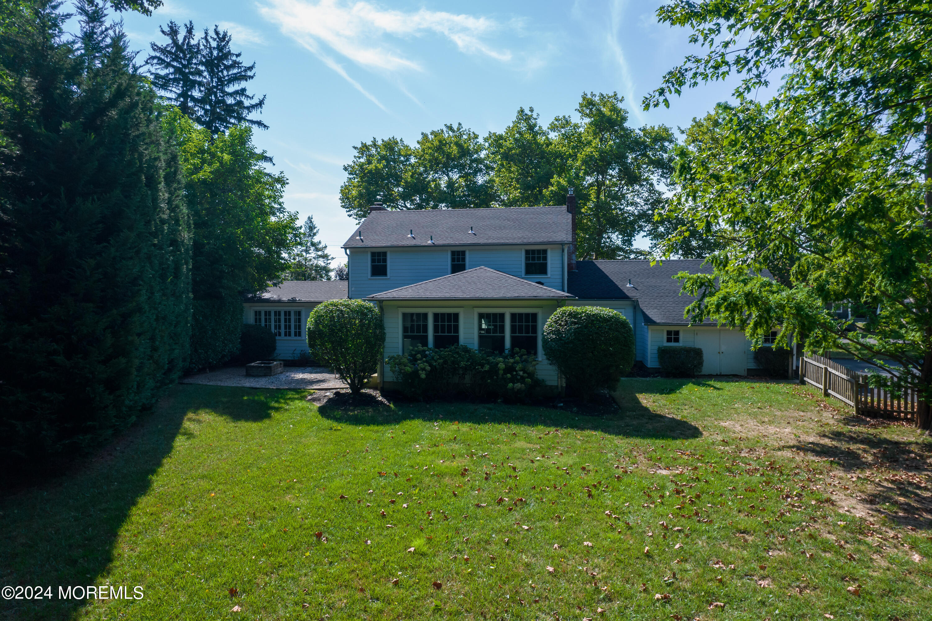 67 Rivers Edge Drive Little Silver, NJ 07739 - Photo 36 of 40 a view of a house with backyard sitting area and garden