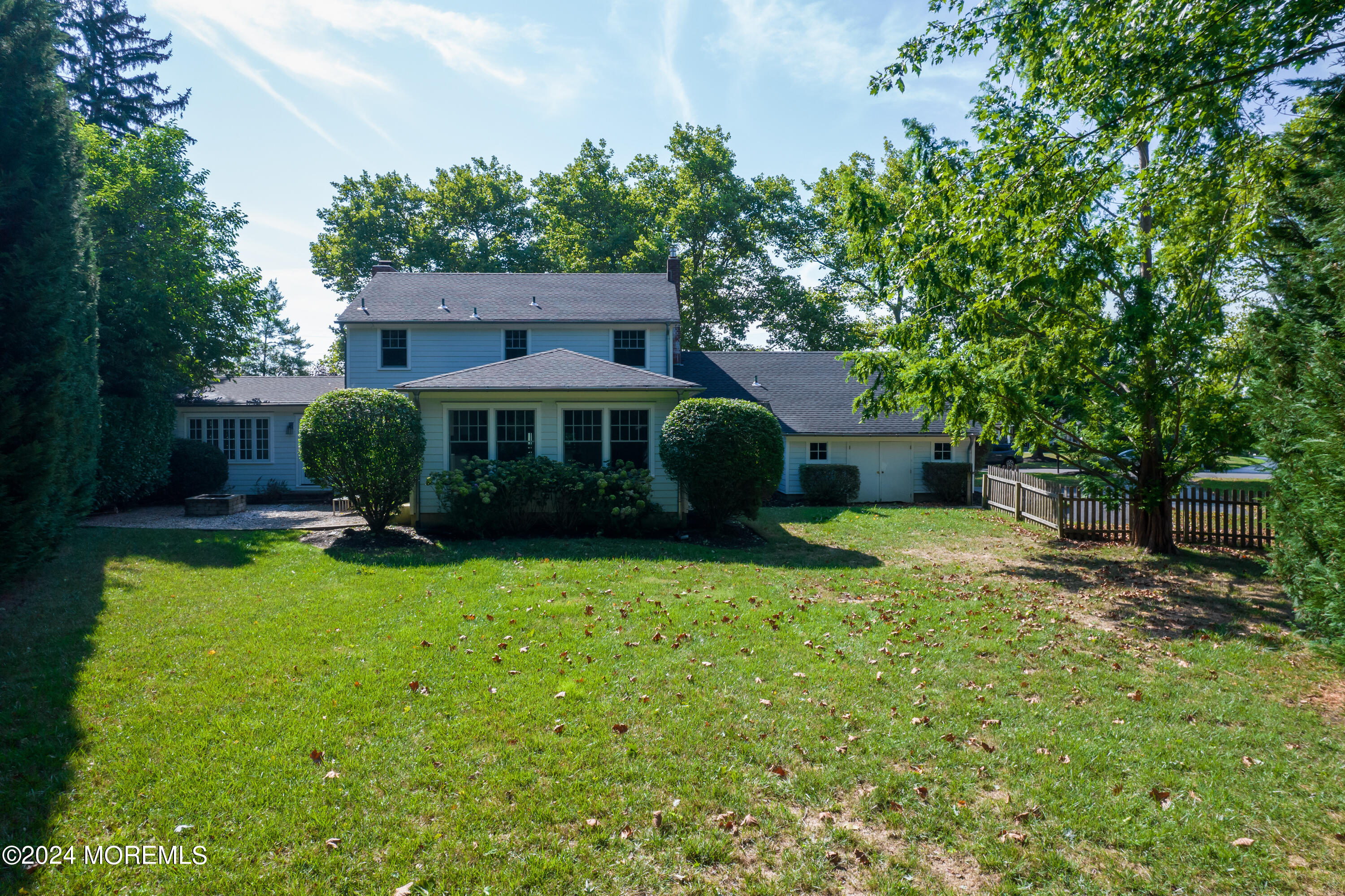 67 Rivers Edge Drive Little Silver, NJ 07739 - Photo 37 of 40 a view of a house with backyard and sitting area