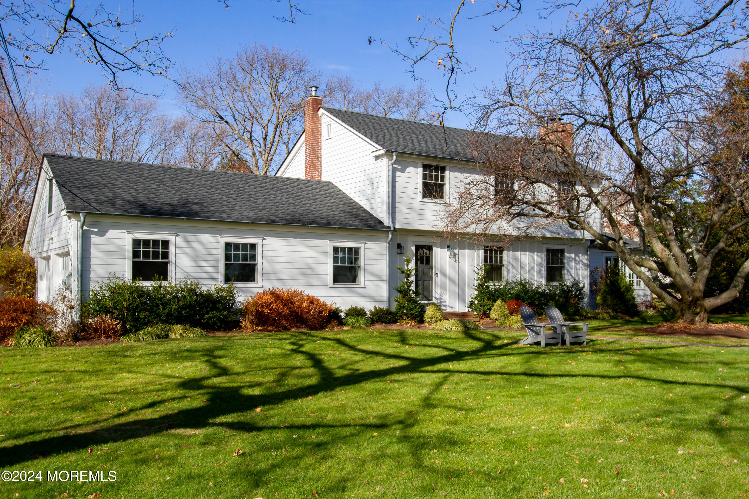 67 Rivers Edge Drive Little Silver, NJ 07739 - Photo 4 of 40 a front view of house with yard and outdoor seating