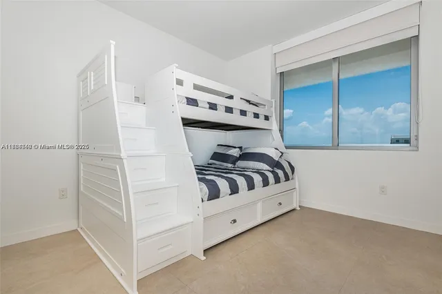 a view of a bedroom with closet
