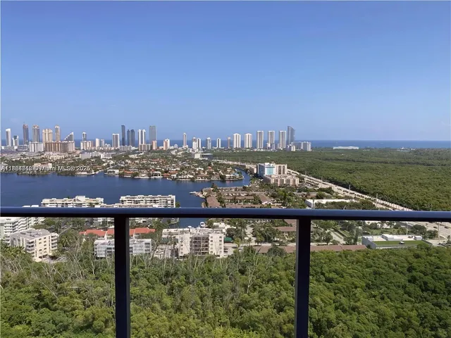 a view of a city skyline from a balcony