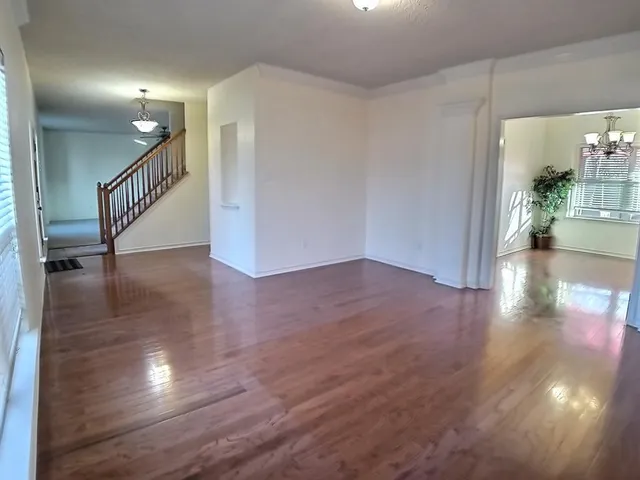 a view of entryway with wooden floor