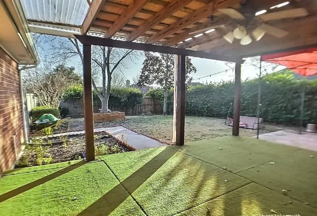 a swimming pool with a garden view