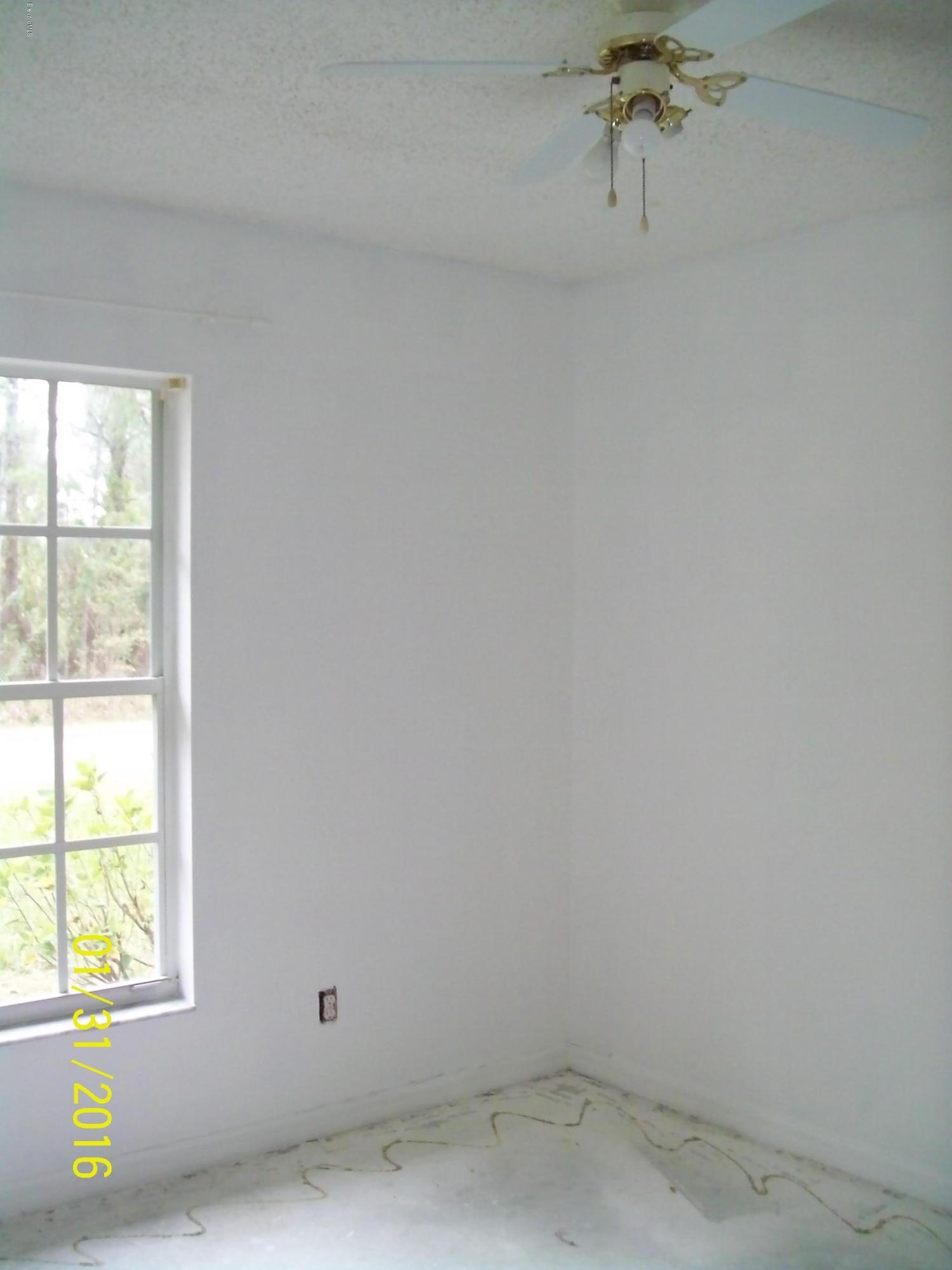 1241 Sapulpa Road Southwest Palm Bay, FL 32908 - Photo 4 of 7 Second Bedroom