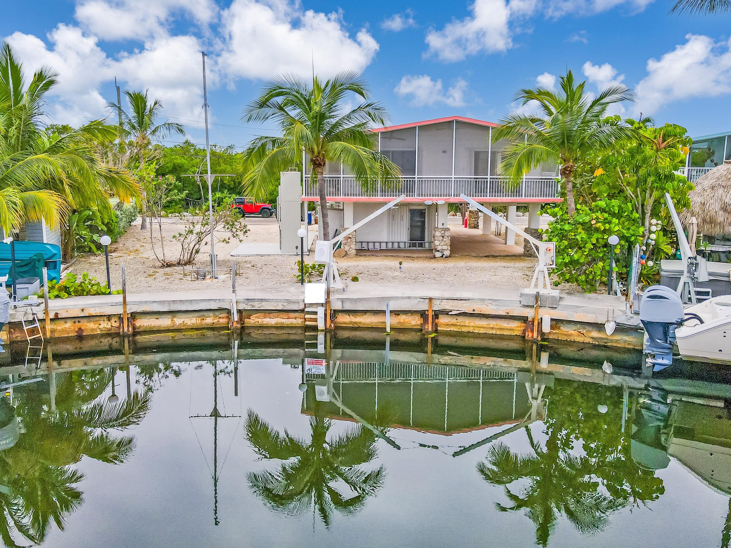 a view of a lake with a house