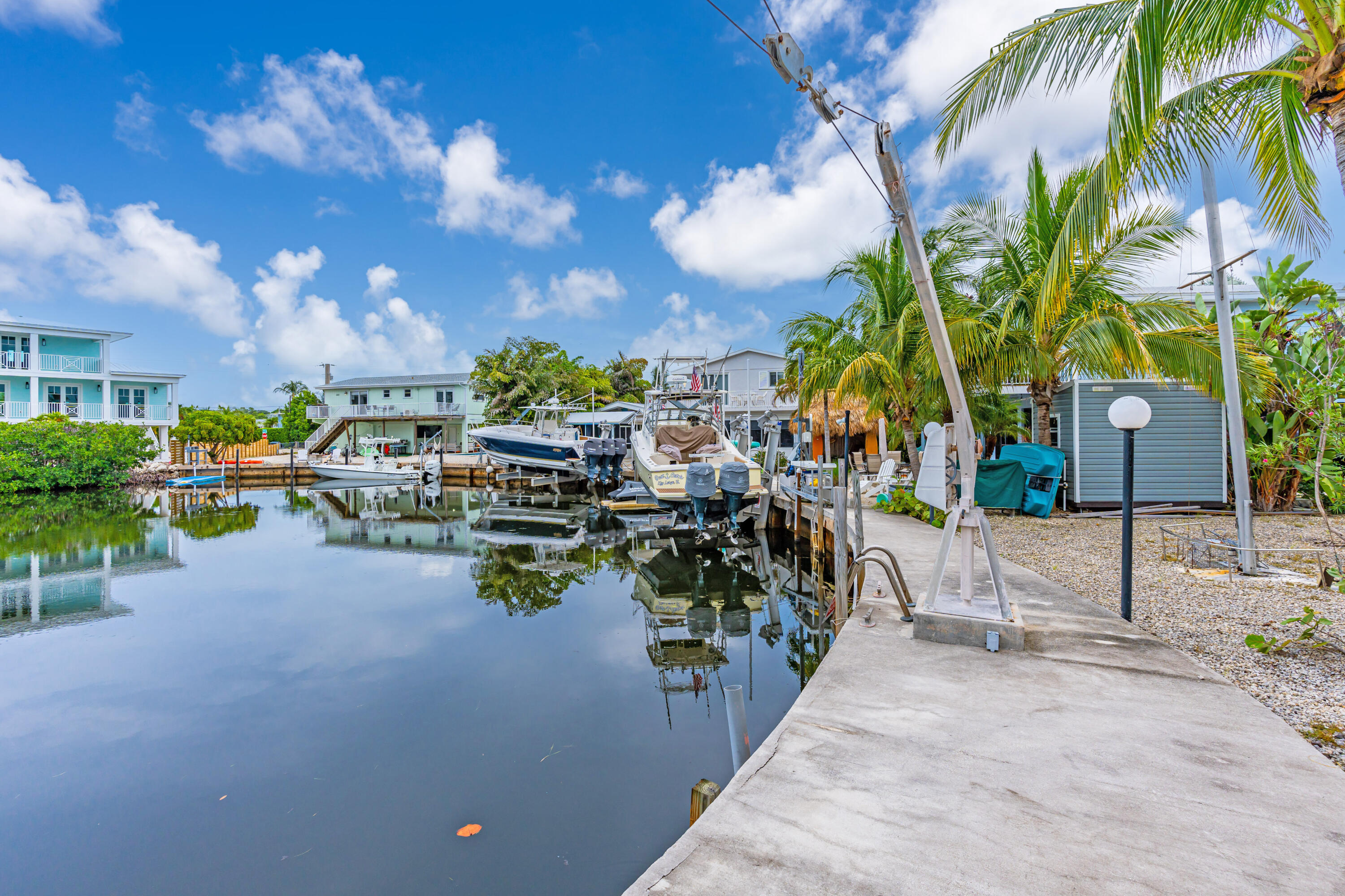 1502 Shaw Drive Key Largo, FL 33037 - Photo 18 of 42 a view of a street with sitting area