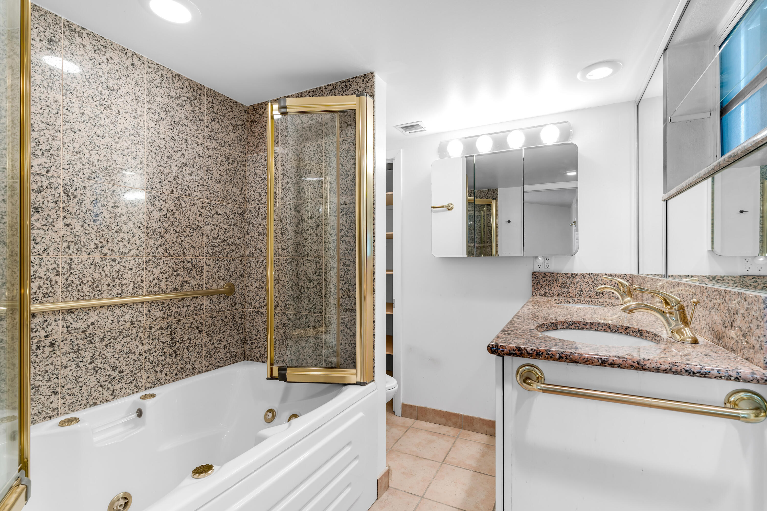 1502 Shaw Drive Key Largo, FL 33037 - Photo 21 of 42 a bathroom with a bath tub and a shower