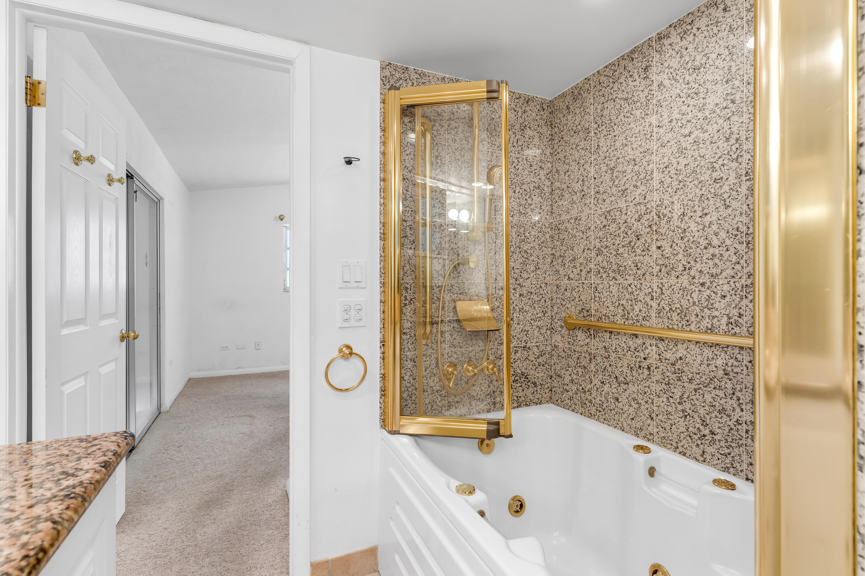 1502 Shaw Drive Key Largo, FL 33037 - Photo 22 of 42 a bathroom with a bathtub and a shower