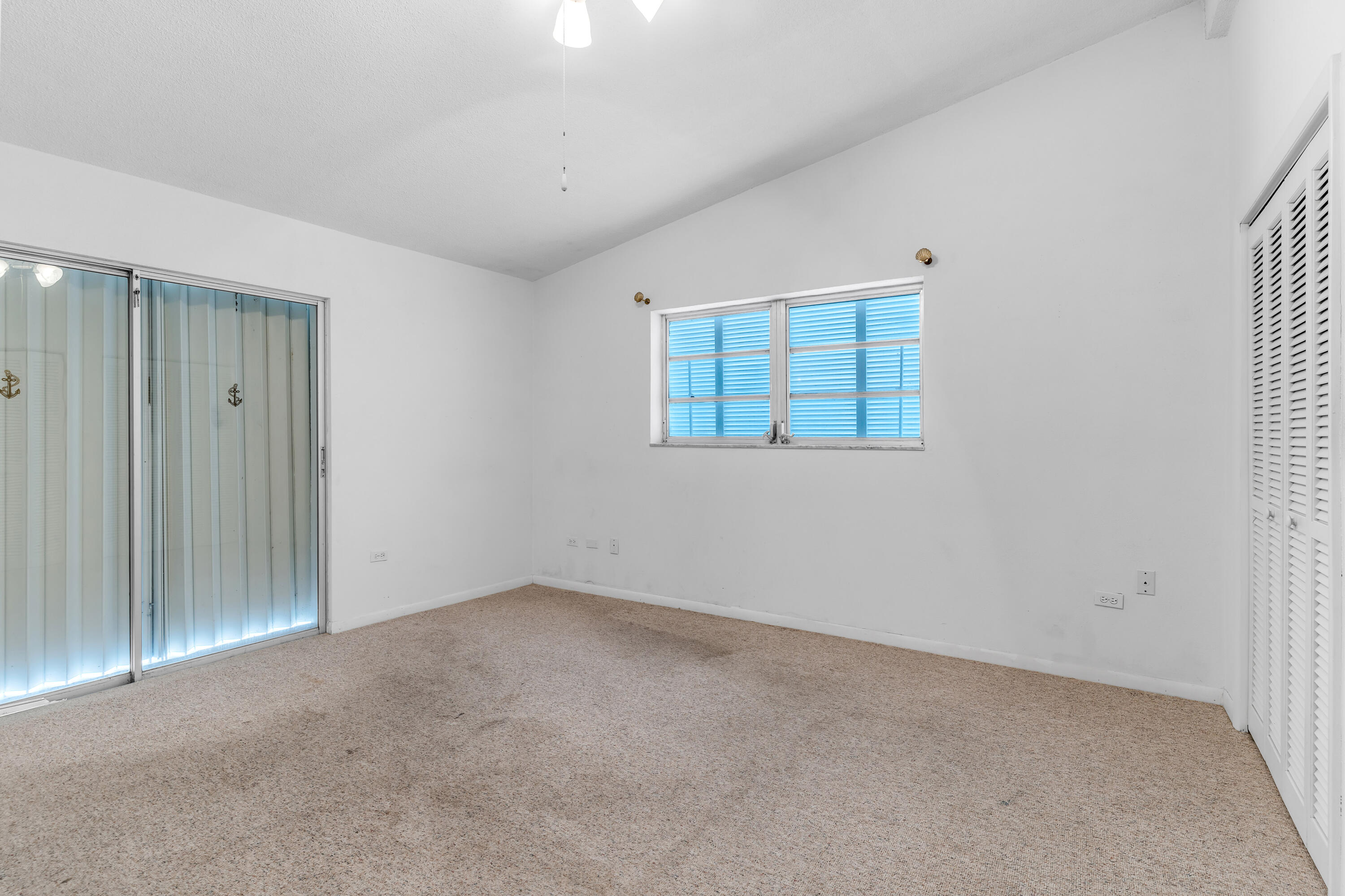 1502 Shaw Drive Key Largo, FL 33037 - Photo 24 of 42 an empty room with windows