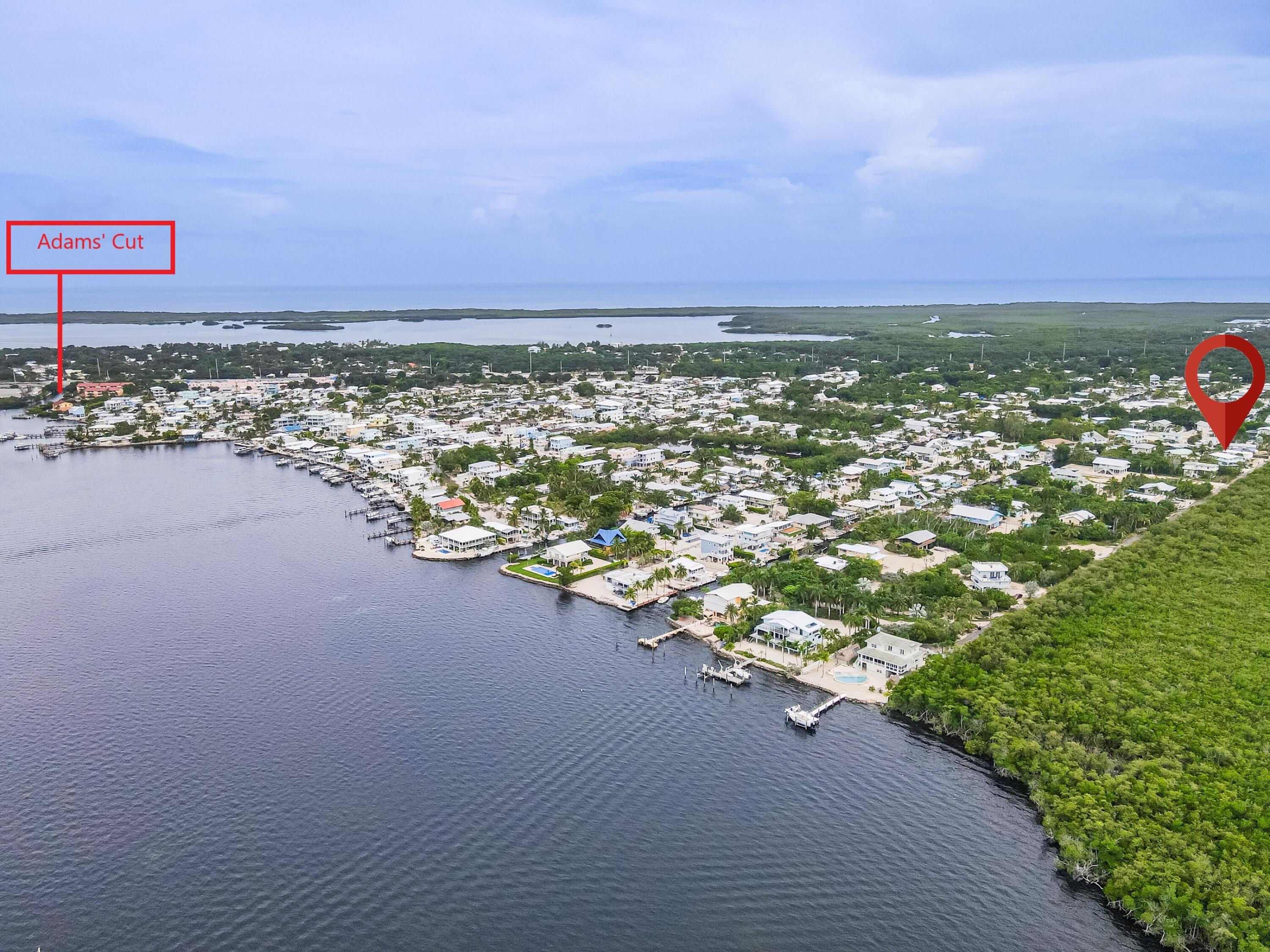 1502 Shaw Drive Key Largo, FL 33037 - Photo 9 of 42 a view of a lake with a city