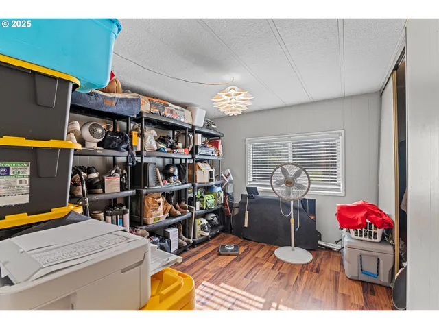 a storage room with furniture and a garage