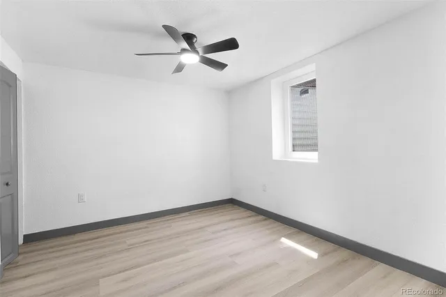 a bathroom with a sink a toilet a shower and a mirror