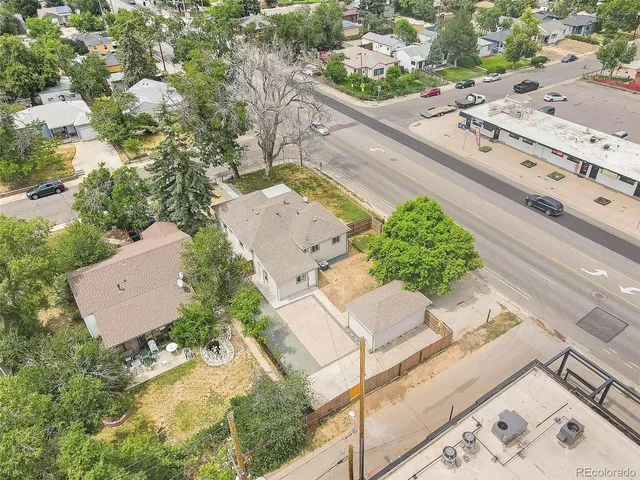 an aerial view of a city with lots of residential buildings