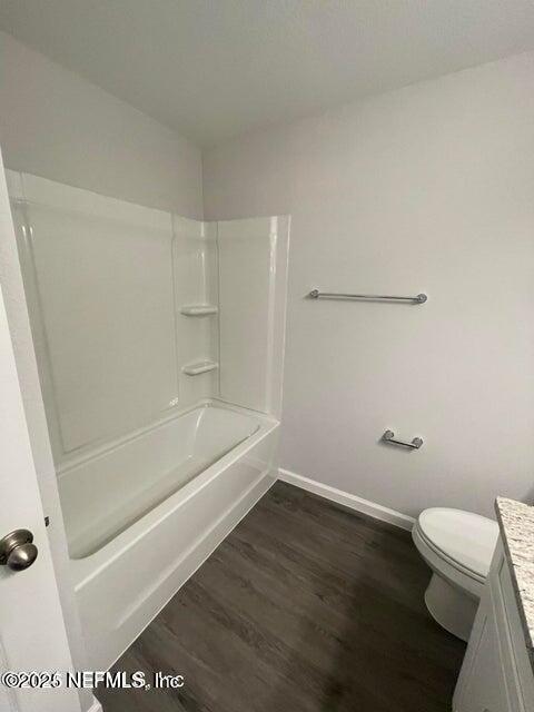 7426 Bowden Road Jacksonville, FL 32216 - Photo 15 of 23 a bathroom with a bathtub and toilet