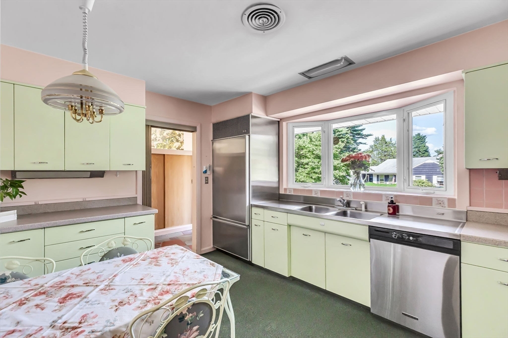 19 Steiger Road Holyoke, MA 01040 - Photo 12 of 22 a kitchen with a sink stove and refrigerator