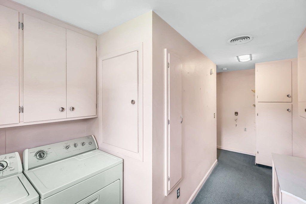 19 Steiger Road Holyoke, MA 01040 - Photo 15 of 22 a view of storage and utility room with washer and dryer