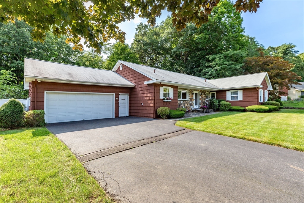 19 Steiger Road Holyoke, MA 01040 - Photo 2 of 22 a front view of house with yard and green space