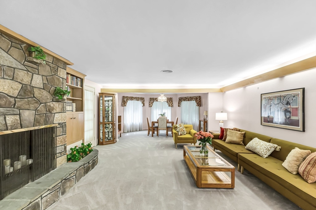 19 Steiger Road Holyoke, MA 01040 - Photo 5 of 22 a living room with furniture and large windows