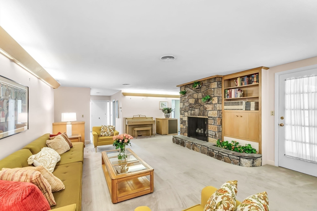 19 Steiger Road Holyoke, MA 01040 - Photo 6 of 22 a living room with furniture and a fireplace