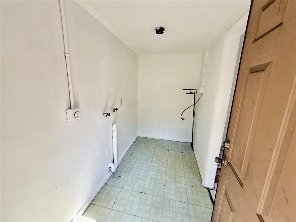 1134 Engman Street Clearwater, FL 33755 - Photo 12 of 27 a view of a room with staircase