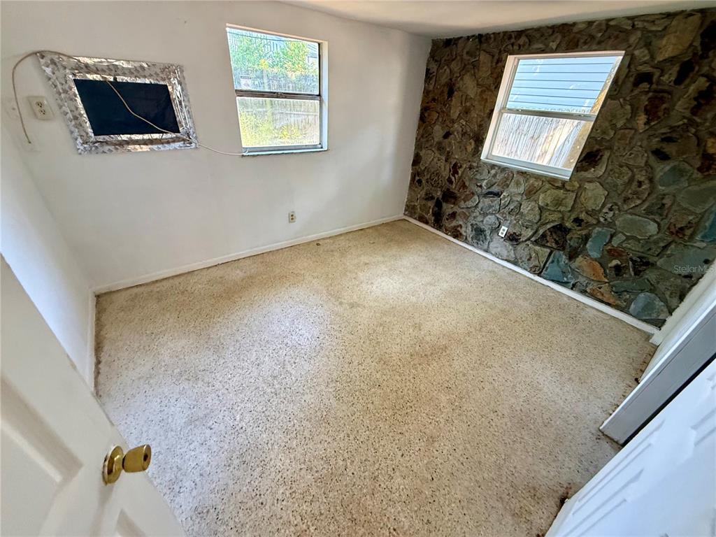1134 Engman Street Clearwater, FL 33755 - Photo 20 of 27 a view of an empty room and a window