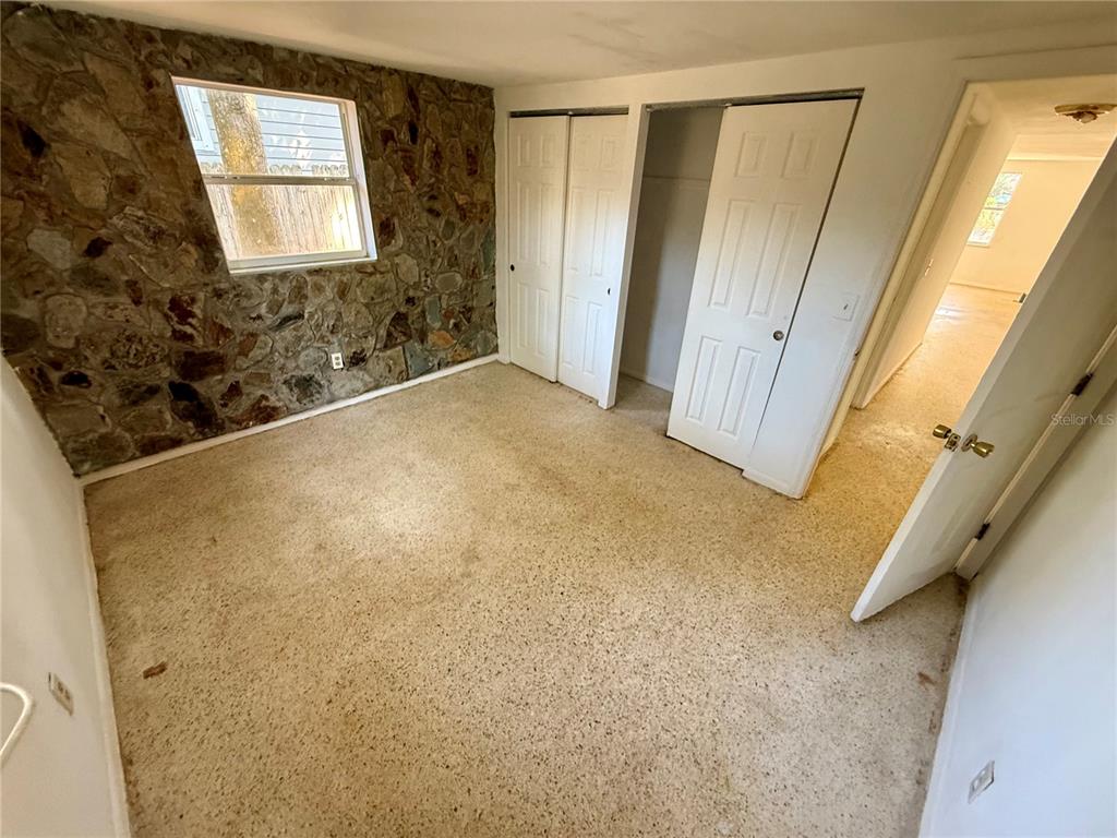 1134 Engman Street Clearwater, FL 33755 - Photo 21 of 27 a view of a bathroom with a sink and a mirror