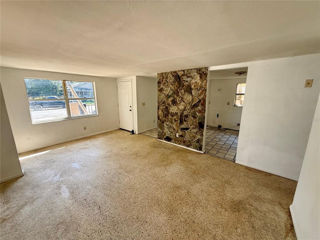 1134 Engman Street Clearwater, FL 33755 - Photo 6 of 27 an empty room with windows and closet