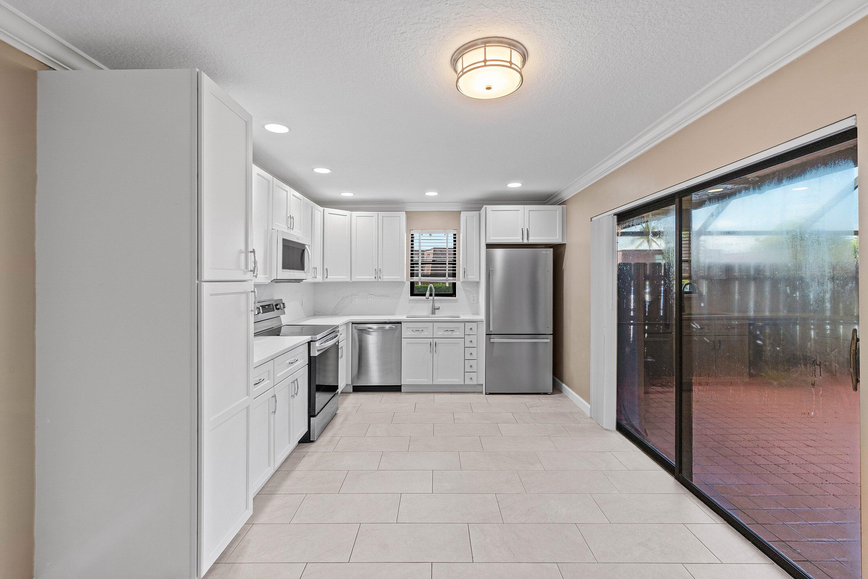 7754 Courtyard Run West Boca Raton, FL 33433 - Photo 12 of 26 Kitchen
