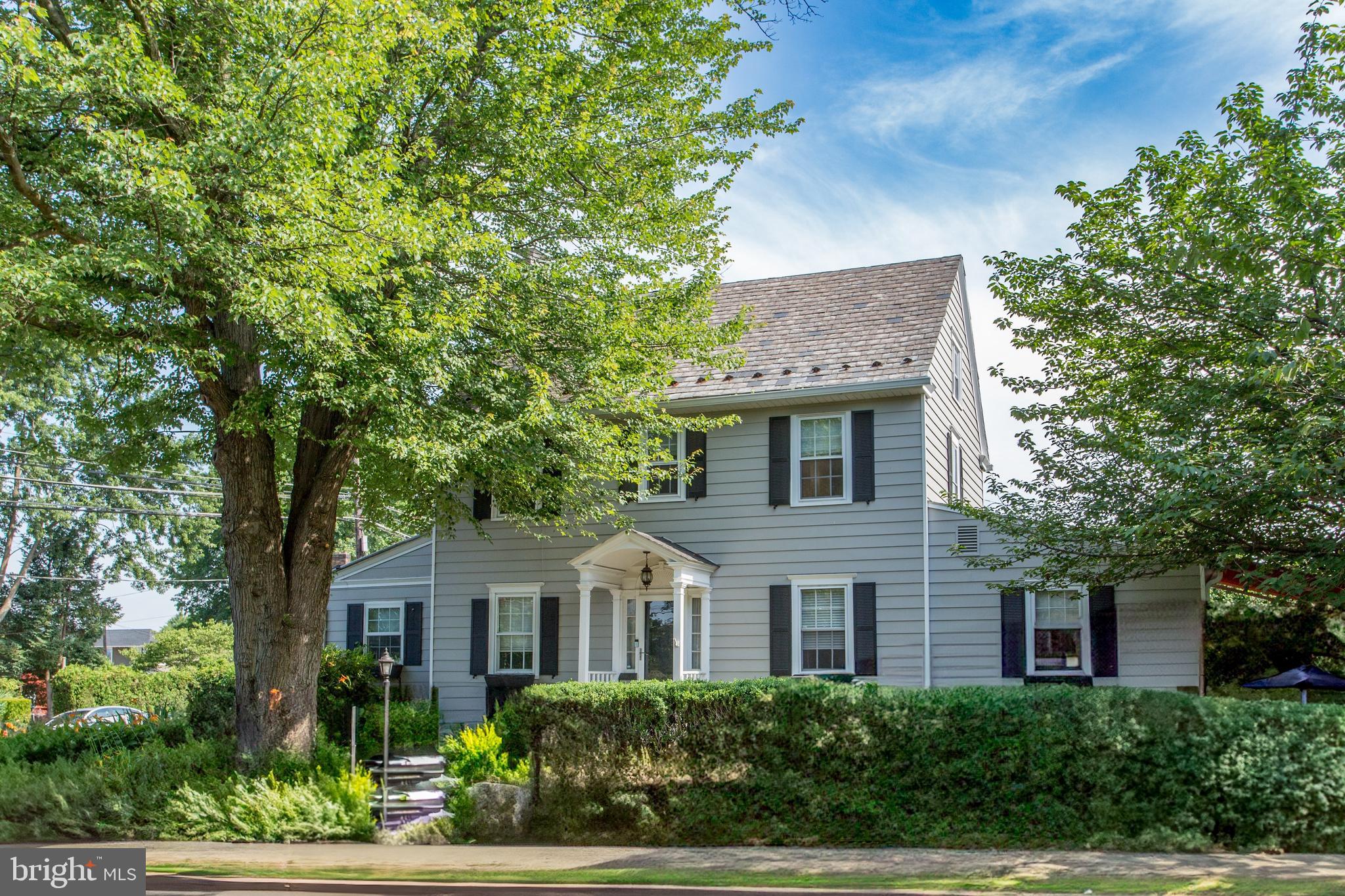105 Wilson Avenue Hellertown, PA 18055 - Photo 1 of 46 a front view of a house with a garden