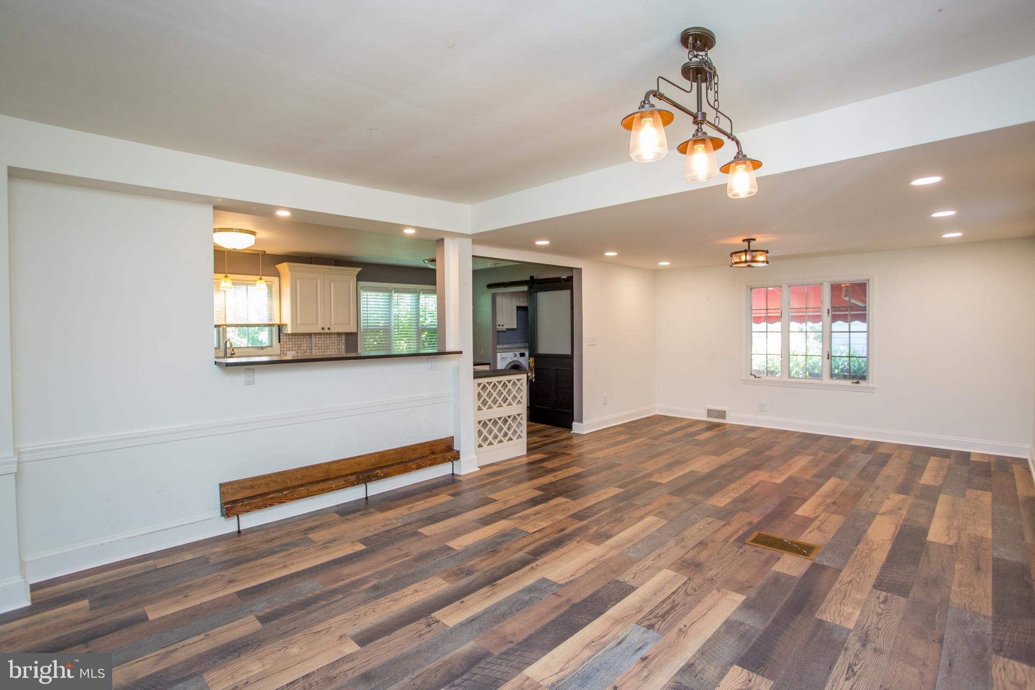105 Wilson Avenue Hellertown, PA 18055 - Photo 11 of 46 a view of empty room and wooden floor