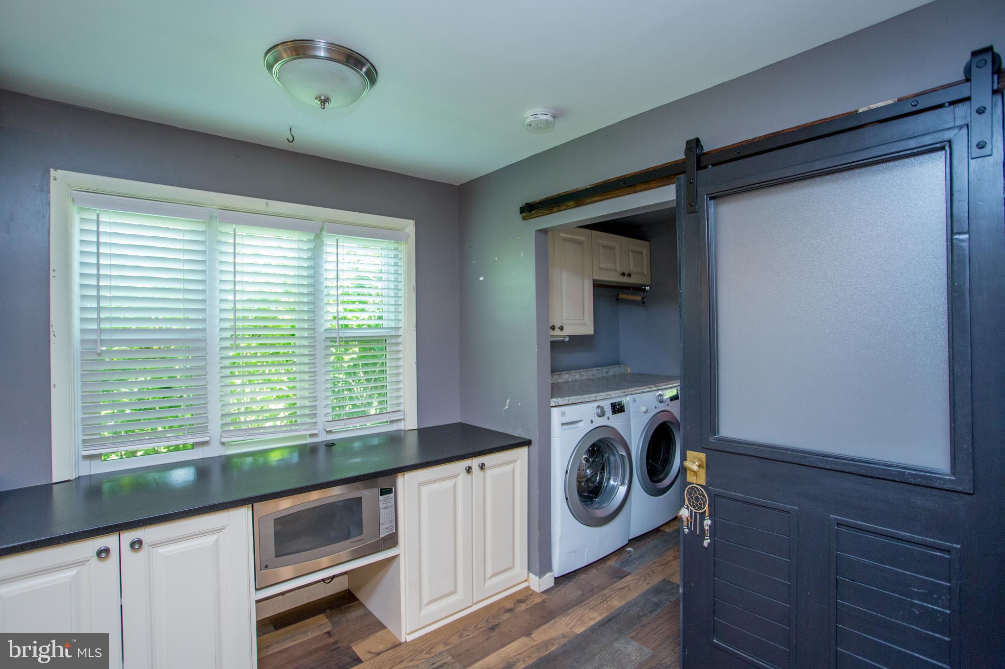105 Wilson Avenue Hellertown, PA 18055 - Photo 19 of 46 a view of a kitchen with washer and dryer