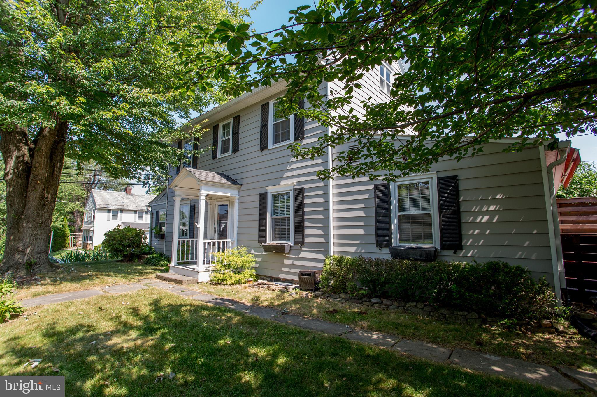 105 Wilson Avenue Hellertown, PA 18055 - Photo 2 of 46 a front view of a house with garden