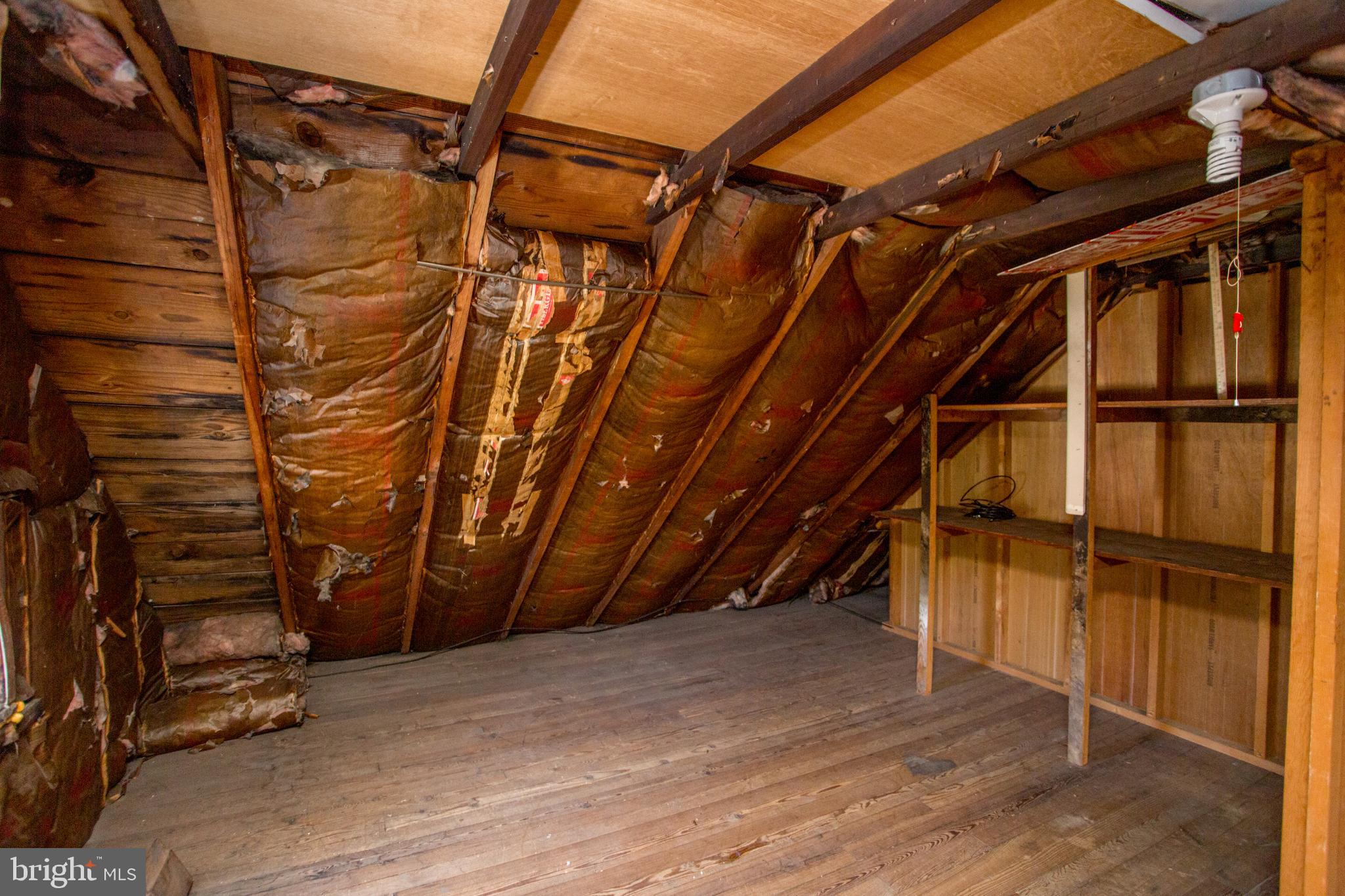 105 Wilson Avenue Hellertown, PA 18055 - Photo 32 of 46 a view of an empty room with wooden walls