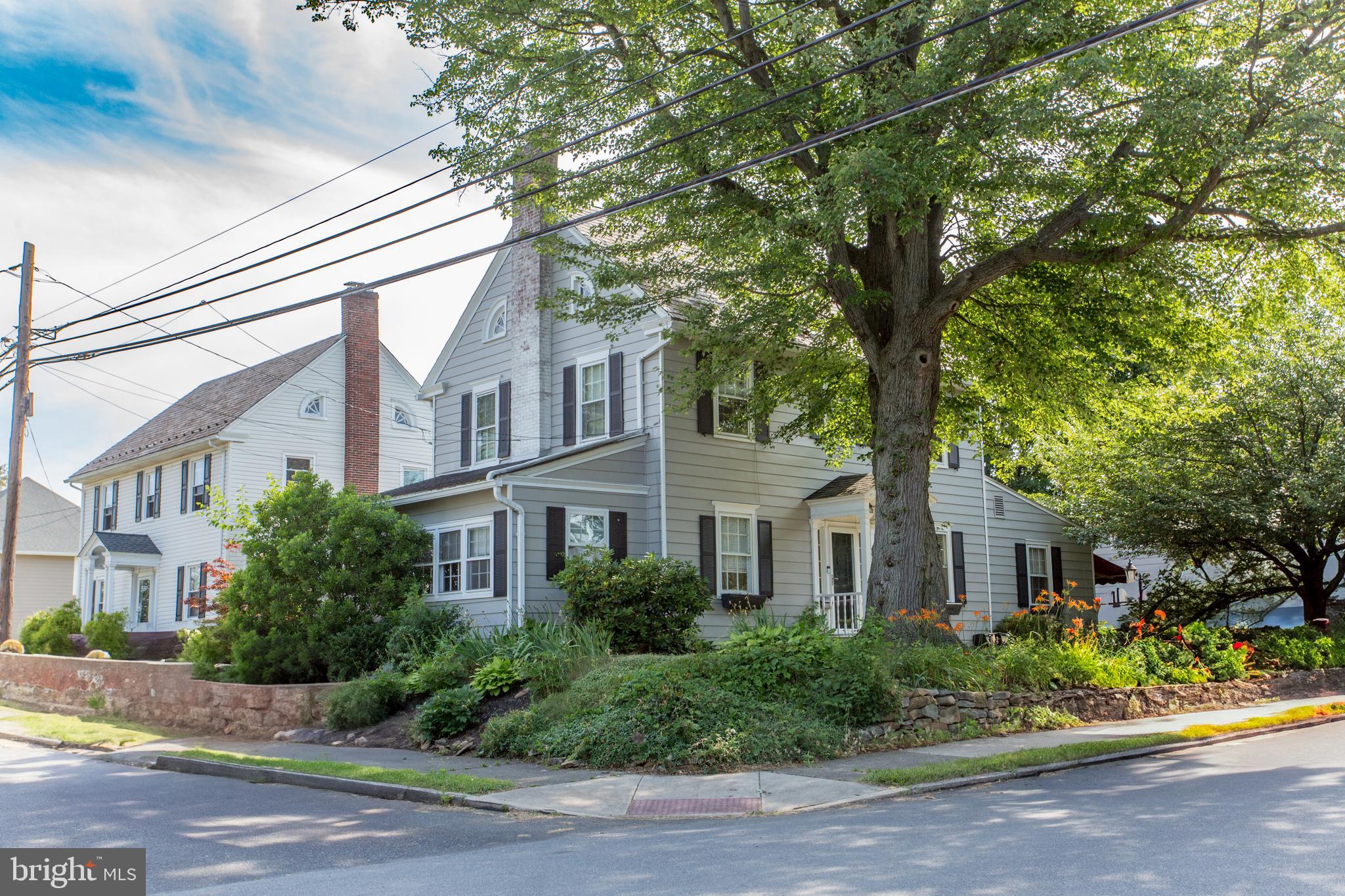 105 Wilson Avenue Hellertown, PA 18055 - Photo 46 of 46 a front view of a house with a garden