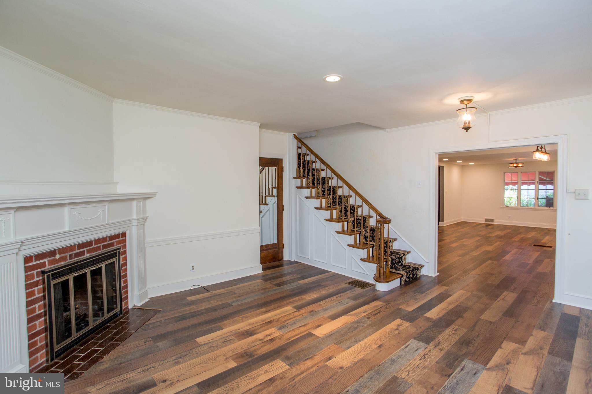 105 Wilson Avenue Hellertown, PA 18055 - Photo 6 of 46 a view of entryway and hall with wooden floor