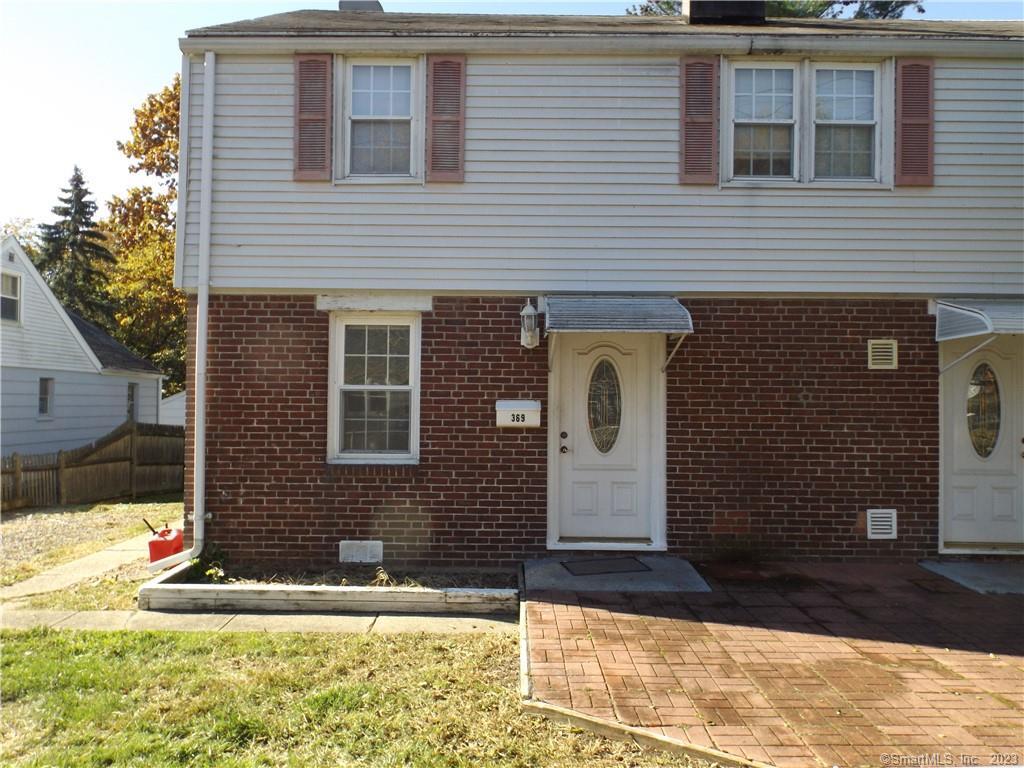 369 High Ridge Drive Bridgeport, CT 06606 - Photo 1 of 1 a front view of a house